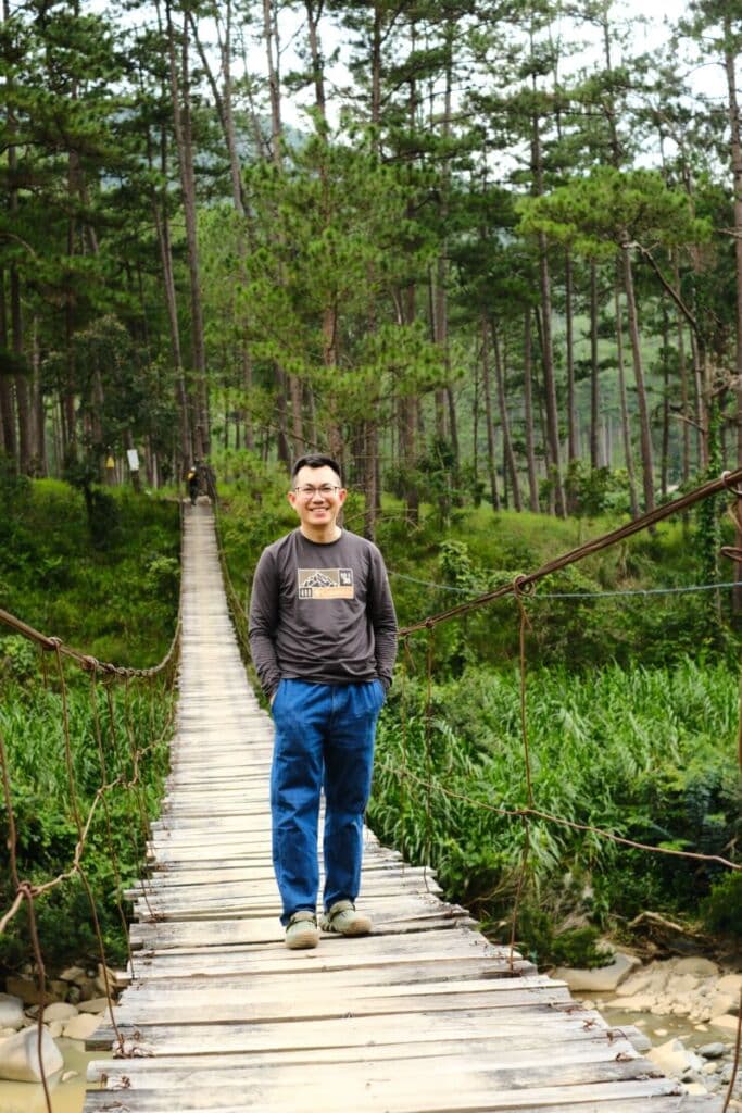 Explore the La Bá Trail – Stream Crossing Through Pine Forest